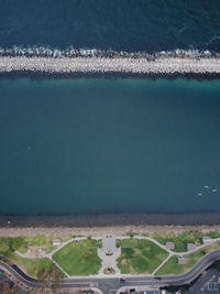 High angle view of swimming pool by sea