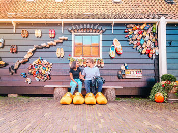 Group of people against building