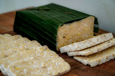High angle view of bread on cutting board