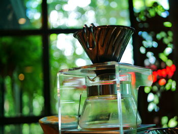 Close-up of drink in glass jar on table