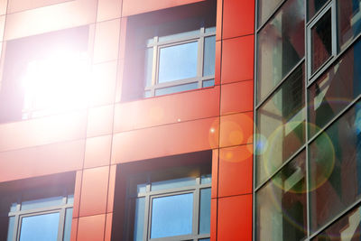 Red, blue color walls of a modern building. part of the facade of the building in the style 