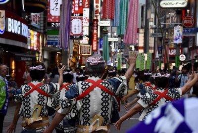 People on street in city