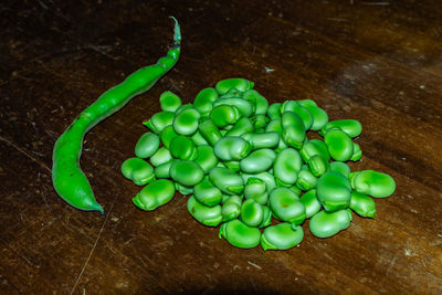 High angle view of green chili on table