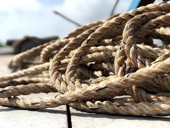 Close-up of rope on pier