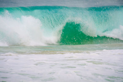 Waves splashing on rocks