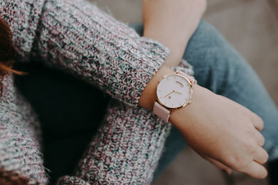 Close-up of woman arm with wristwatch