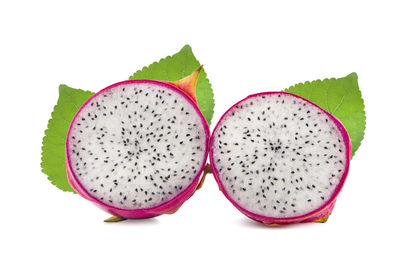 Close-up of fruits against white background