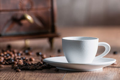 Close-up of coffee cup on table