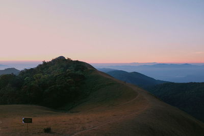 Scenic view of mountains against sky during sunset