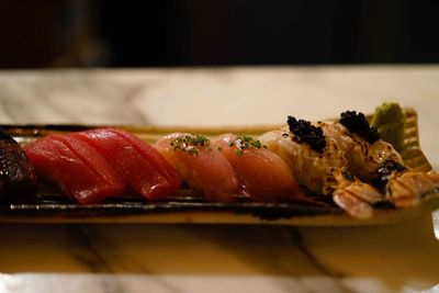 Close-up of sushi served in plate on table