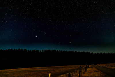 Scenic view of star field against sky at night