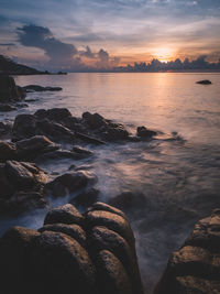 Scenic view of sea against sky during sunset