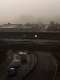 High angle view of vehicles on road in city