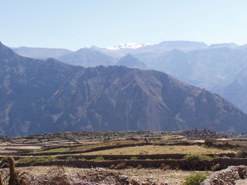 Scenic view of mountains against clear sky