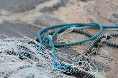 Close-up of ropes with fishing net