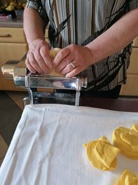 Midsection of man preparing food