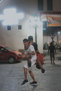 People walking on street in city