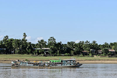 Scenic view of river against clear sky