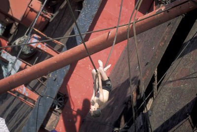 High angle view of bicycle on metal wall