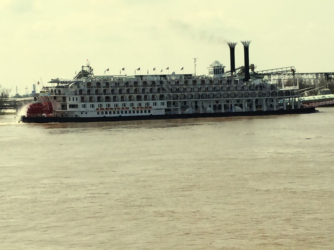 water, waterfront, nautical vessel, building exterior, sea, built structure, architecture, transportation, mode of transport, boat, harbor, sky, commercial dock, crane - construction machinery, moored, ship, industry, pier, freight transportation, river