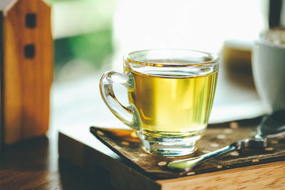 Close-up of tea in glass on table