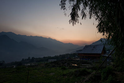 Scenic view of mountains against sky during sunset