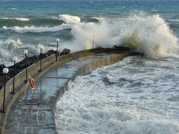 High angle view of surf on shore