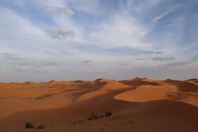 Scenic view of desert against sky