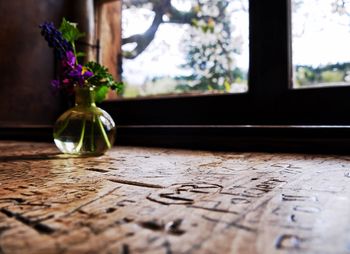 Flower vase on table at home