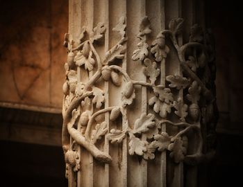 Close-up of statue against wall