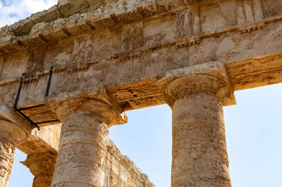 Low angle view of old ruins against sky