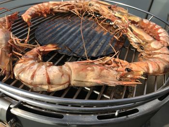 Close-up of meat on barbecue grill
