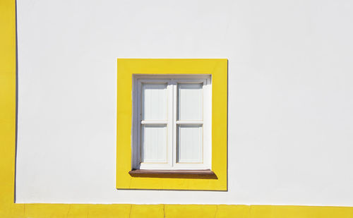 Yellow window of house