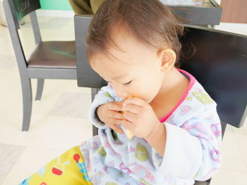 Close-up of cute baby eating food