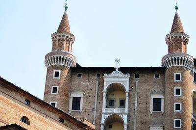 Low angle view of historic building against clear sky