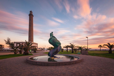 Statue of liberty against sky during sunset