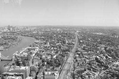 High angle view of city buildings against sky