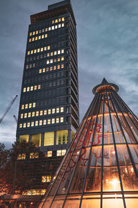 Low angle view of modern building against sky