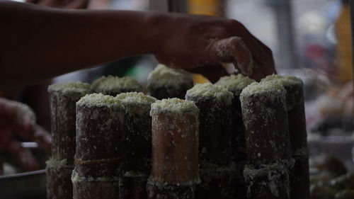 Close-up of hand holding ice cream