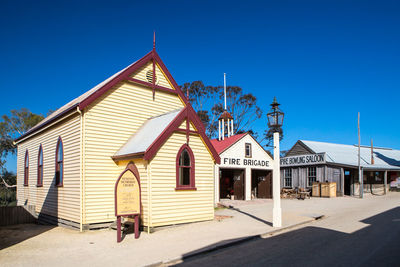 View of buildings against blue sky