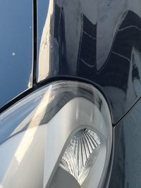 Close-up of car against sky