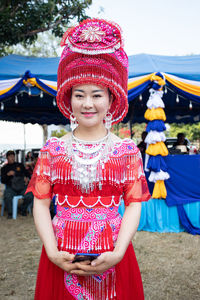 Full length of a smiling young woman