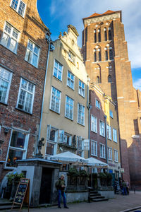 Low angle view of buildings against sky