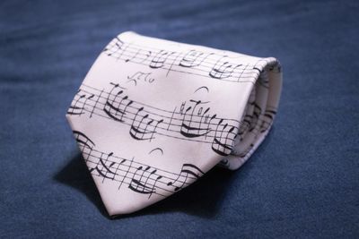 High angle view of text on paper on table