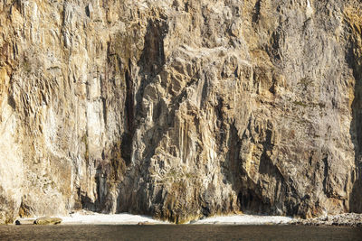 Scenic view of sea and rocks, slieve league