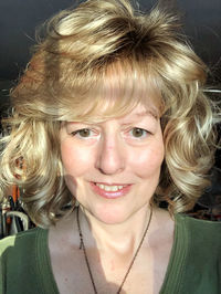 Close-up portrait of a smiling young woman