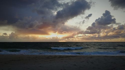 Scenic view of sea against sky during sunset