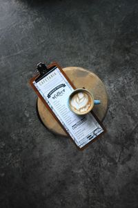 High angle view of coffee cup on table