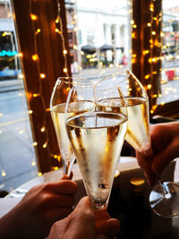 Close-up of hand holding wine glass