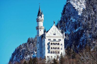 Low angle view of cathedral against clear blue sky